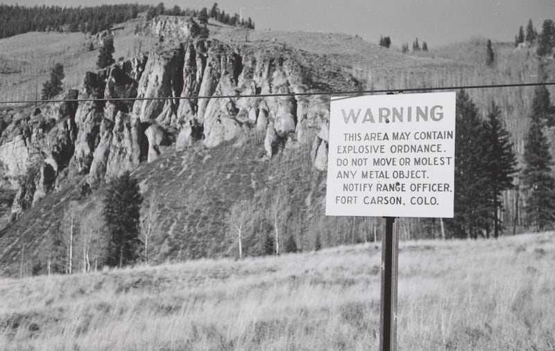 A sign in the early 1960s warns of “explosive ordnance” in the Camp Hale area. To maintain the secrecy around Camp Hale and keep locals at bay, the CIA created a false story of atomic testing programs being conducted there.