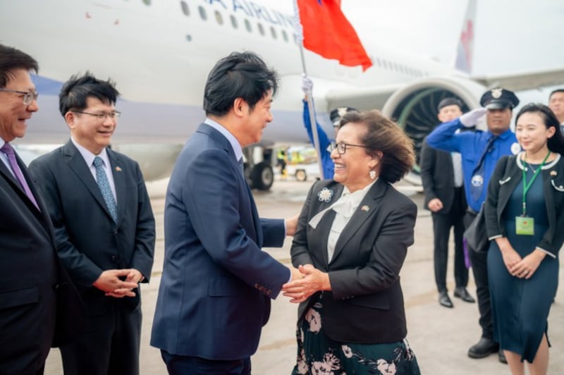 Marshall Islands President Hilda Heine greets Taiwanese President Lai Ching-te (C-L) upon arriving in Majuro, in the Marshall Islands on Dec. 3, 2024.