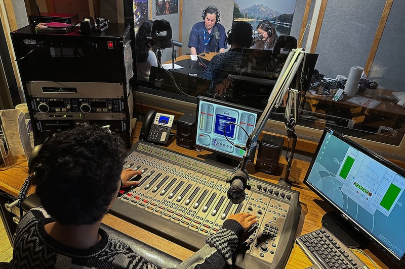 RFA journalists record a podcast at a studio at Radio Free Asia headquarters in Washington, May 23, 2024.